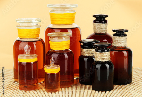 Photo: Medicine bottles on beige background Medicine bottles on beige background