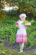 little girl in garden