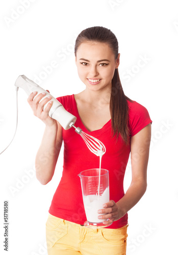Photo: smile girl shakes up cream smile girl shakes up cream