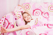 Foto: Adorable little girl in her bed Adorable little girl in her bed
