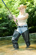woman fishing in river