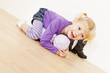 Photo: little girl playing with a doll little girl playing with a doll