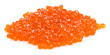 heap of red caviar on white