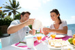 Couple enjoying breakfast in resort