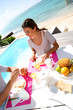 Photo: Couple enjoying breakfast in resort Couple enjoying breakfast in resort