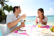 Couple enjoying breakfast in resort