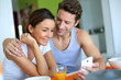 Foto: Couple having breakfast at home Couple having breakfast at home