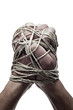 man hands tied with string