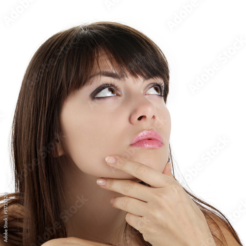 Photo: girl looking and pointing with eyes girl looking and pointing with eyes