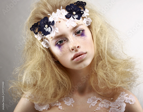 Photo: Styled Blonde with Colorful Makeup - Blue Eye Shadows. Arts Styled Blonde with Colorful Makeup - Blue Eye Shadows. Arts