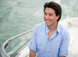 Man driving a yacht