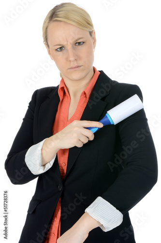 Photo: Junge Frau mit Fusselrolle Junge Frau mit Fusselrolle