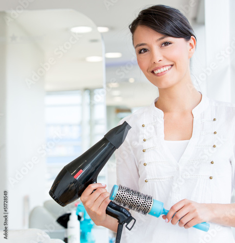 Photo: Stylist at the beauty salon Stylist at the beauty salon