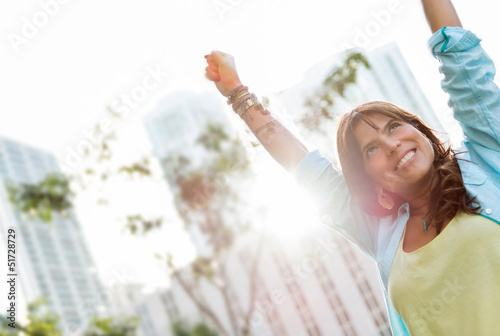 Photo: Successful woman with arms up Successful woman with arms up