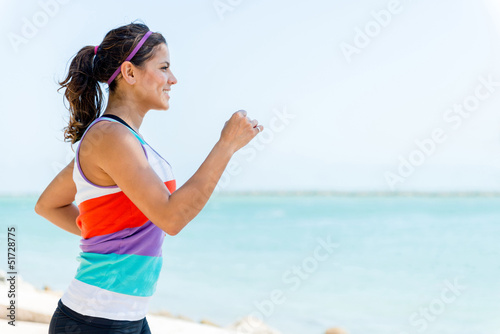 Photo: Girl running outdoors Girl running outdoors