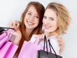 Pretty girls with shopping bags are good friends