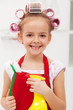 Photo: Little girl with cleaning utensils Little girl with cleaning utensils
