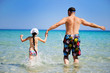 Photo: Happy father and his daughter ready to swim Happy father and his daughter ready to swim