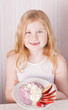 smile girl is eating healthy food