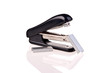 rusty stapler whit staples on white background