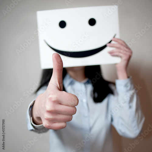 Photo: woman showing thumbs up woman showing thumbs up