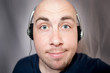 The young man listens to music