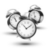 Ringing alarm clocks on white background