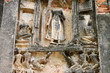 Old Buddha image on pagoda wall