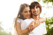 Young attractive couple together outdoors