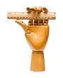 Photo: Wooden hand and ruler Wooden hand and ruler