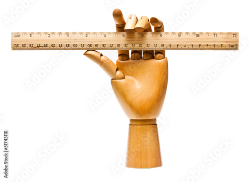 Photo: Wooden hand and ruler Wooden hand and ruler