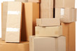 Different cardboard boxes in room
