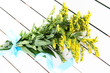 Bouquet of mimosa on wooden background