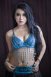 Foto: Attractive Arabian belly dancer in blue costume Attractive Arabian belly dancer in blue costume