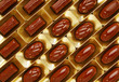 chocolate candies in a gold gift box