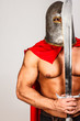 Calm warrior with a sword close to his face