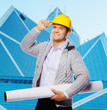 Photo: foreman in hardhat is holding sketch roll foreman in hardhat is holding sketch roll