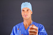 Dentist doctor over dark background