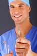 Dentist doctor over dark background