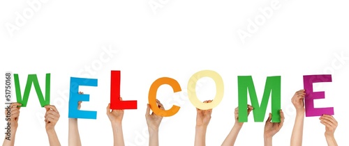 Photo: hands holding WELCOME hands holding WELCOME