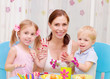 Happy family painted Easter eggs