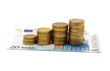 concept of growing business with coins and banknotes