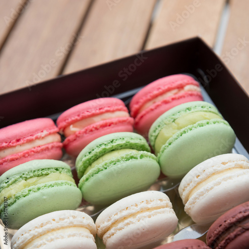 Photo: Macarons on a gift box Macarons on a gift box