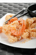 fried mixed seafood with chopsticks
