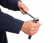 Photo: Hand of auto mechanic with wrench. Hand of auto mechanic with wrench.