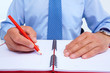 Foto: Businessman with a pencil. Businessman with a pencil.