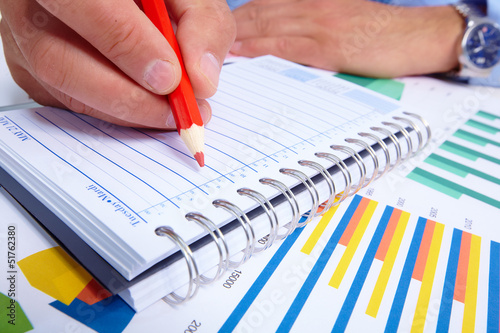 Photo: Writing business people. Writing business people.