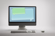 Desktop computer with blank speech bubble