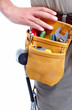 Worker with a tool belt.