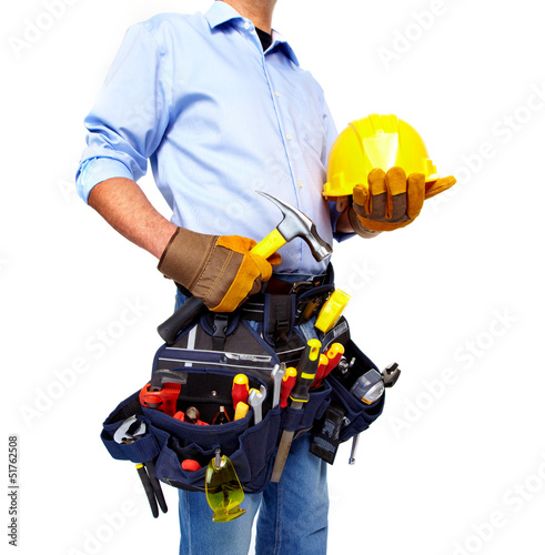 Photo: Worker with a tool belt. Construction. Worker with a tool belt. Construction.